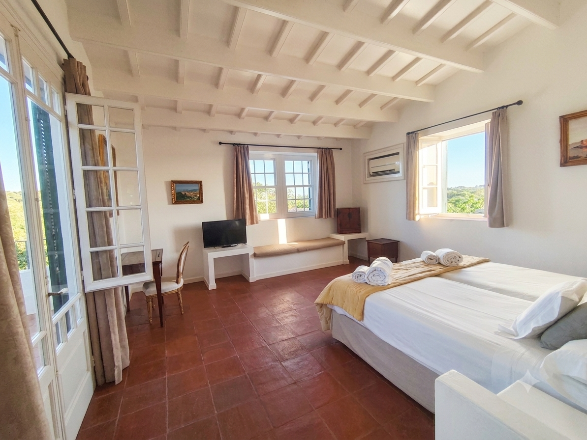 Spacious and bright double bedroom at finca Son Bonaventura, garden view, Menorca